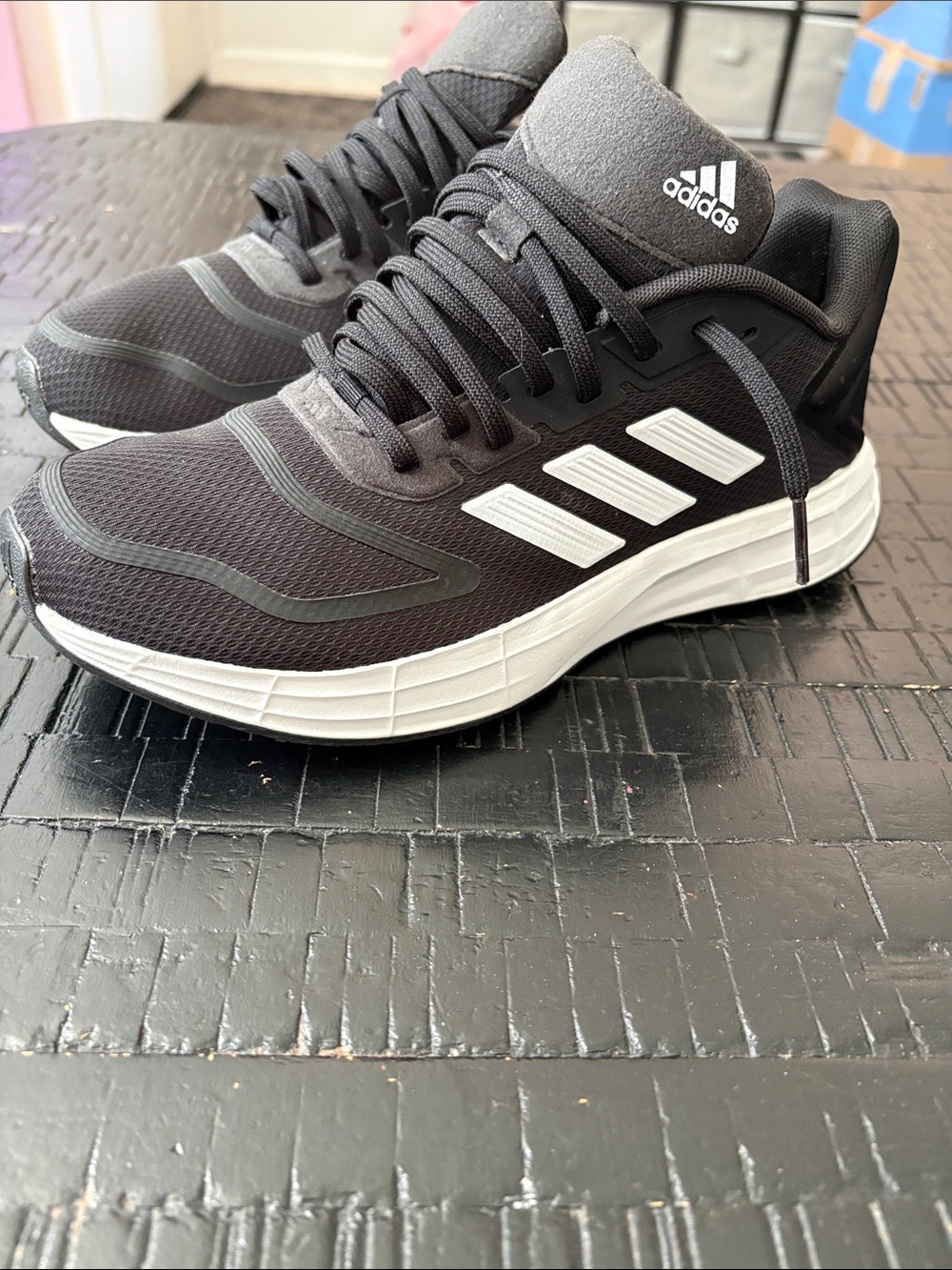 adidas Black and White Runner with Signature Three Stripes